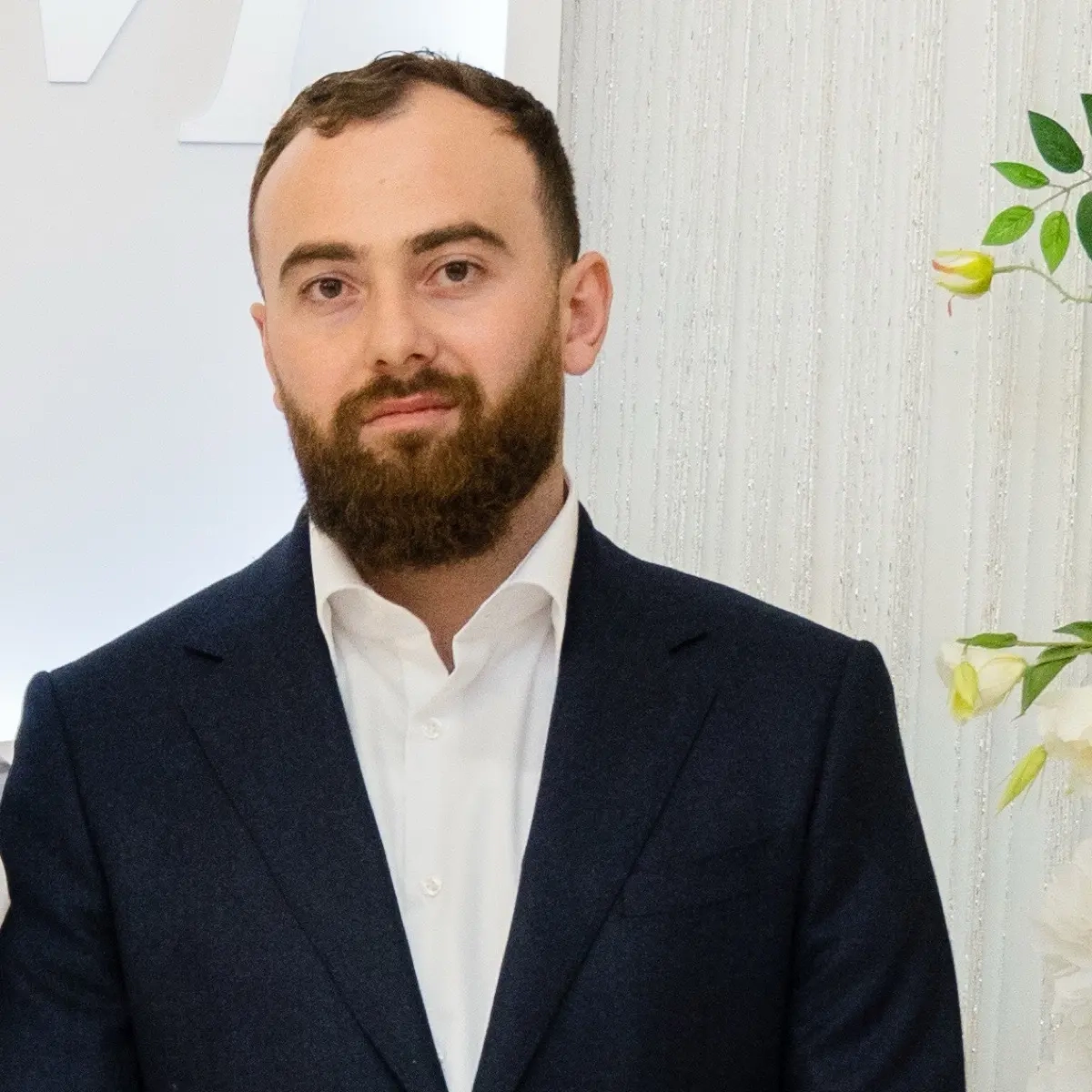 Малик Этезов